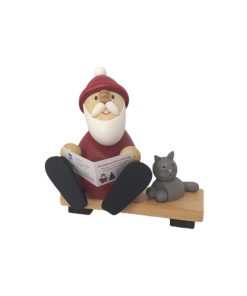 Weihnachtsmann auf Bank